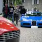 A picture taken on September 28, 2019 at the Bonmont Abbey in Cheserex, western Switzerland shows a 2010 Bugatti Veyron EB 16.4 Coupe model car (R) and a 2011 Aston Martin One-77 Coupe model car during an auction preview by sales house Bonhams of sport cars belonging to the son of the Equatorial Guinea's President. - A collection of luxury cars seized from Equatorial Guinea's vice president Teodorin Obiang Nguema will be auctioned off in Switzerland on September 29, 2019 and are estimated to bring in 18.5 million Swiss francs. (Photo by FABRICE COFFRINI / AFP)        (Photo credit should read FABRICE COFFRINI/AFP/Getty Images)
