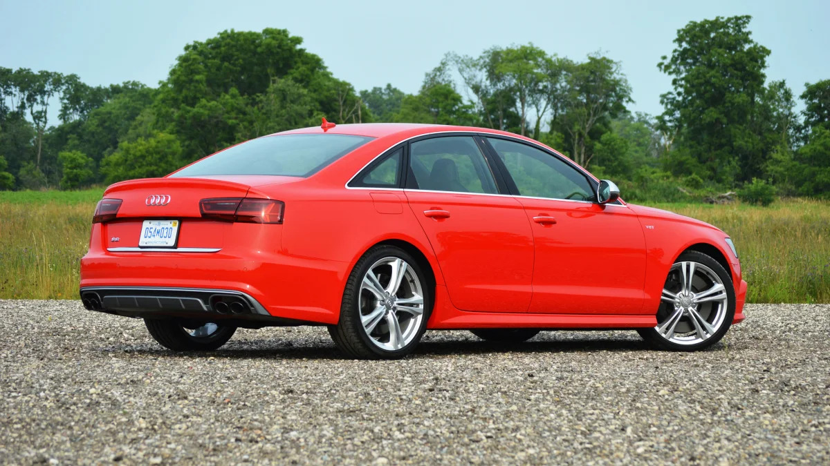 2016 audi s6 red back side view