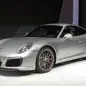 The 2016 Porsche 911 Carrera, now with a turbocharged engine in the standard car, unveiled at the Frankfurt Motor Show, front three-quarter view.