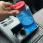 2023 Toyota Sienna - covered front cupholders with Nalgene