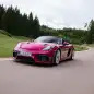 2024 Porsche 718 Spyder RS in Ruby Star Neo action front three quarter low