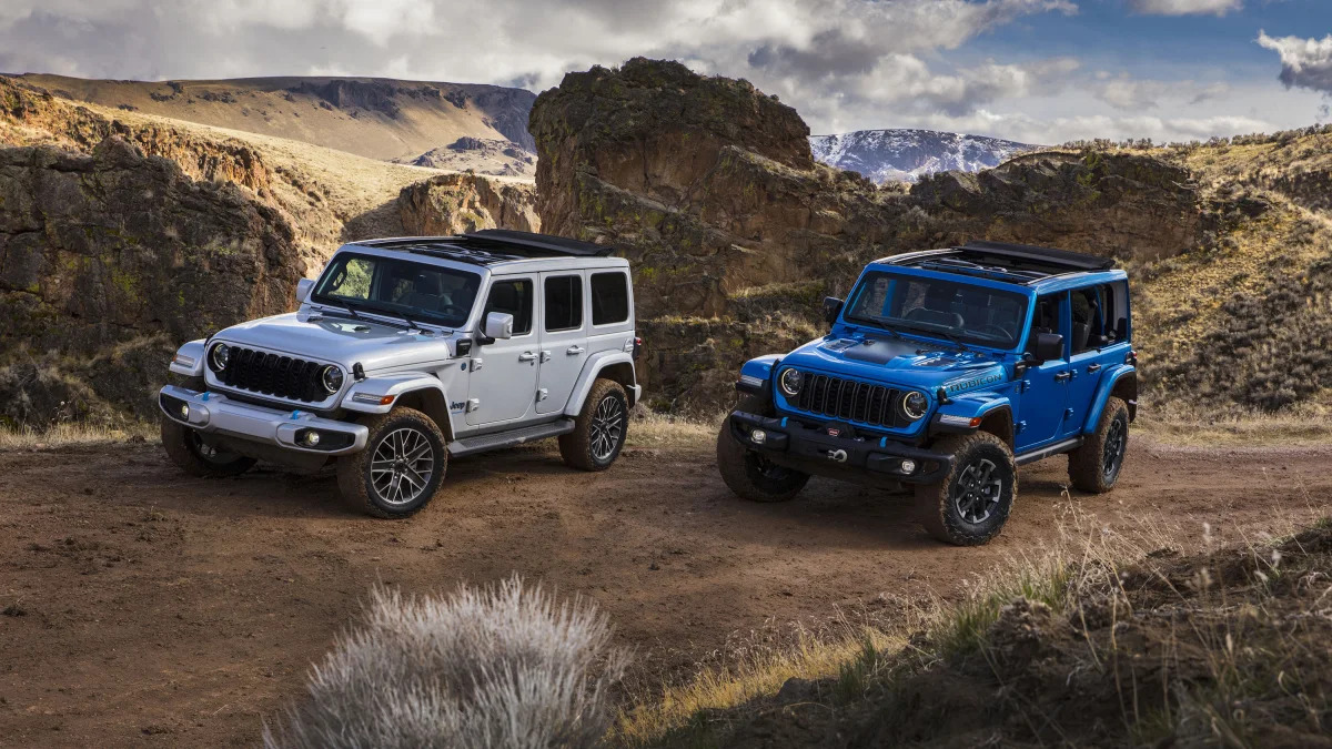 New 2024 Jeep® Wrangler High Altitude 4xe (left) and Jeep Wrang