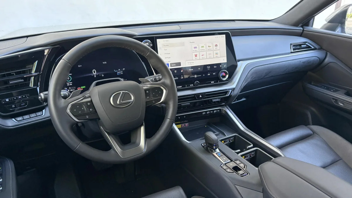 2024 Lexus TX 550h+ interior from driver door