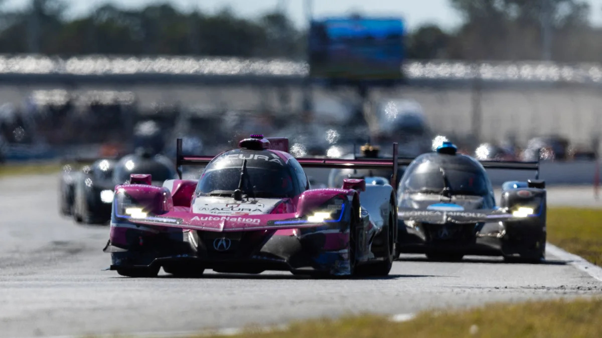 DAYTONA BEACH, FLORIDA - JANUARY 30: The #60 Meyer Shank Racing w/ Curb-Agajanian Acura DPi of Helio Castroneves , Oliver Jarvis, Tom Blomqvist, and Simon Pagenaud drives during the Rolex 24 at Daytona International Speedway on January 30, 2022 in Daytona Beach, Florida.   James Gilbert/Getty Images/AFP / AFP / GETTY IMAGES NORTH AMERICA / James Gilbert