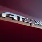 2022 GMC Sierra 1500 AT4X in Cayenne Red Tintcoat badge