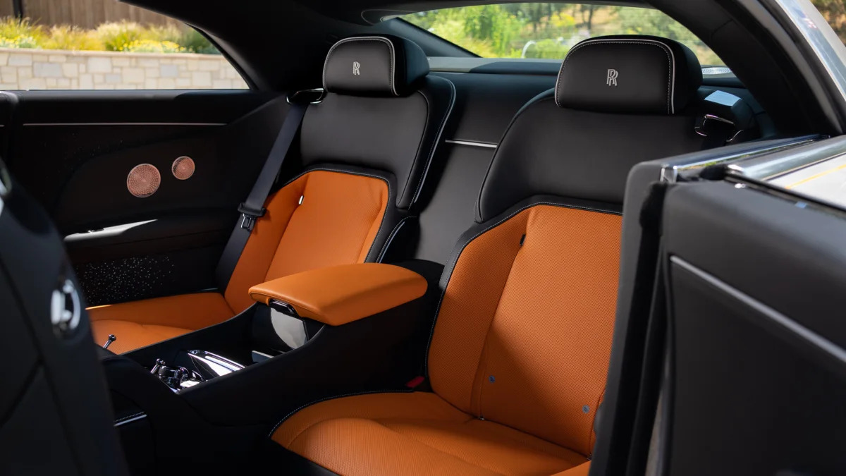 2024 Rolls-Royce Spectre interior back seat black and orange