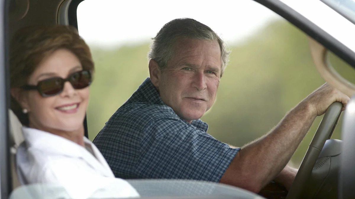 Former US President George W. Bush and First Lady Laura Bush in Ford truck