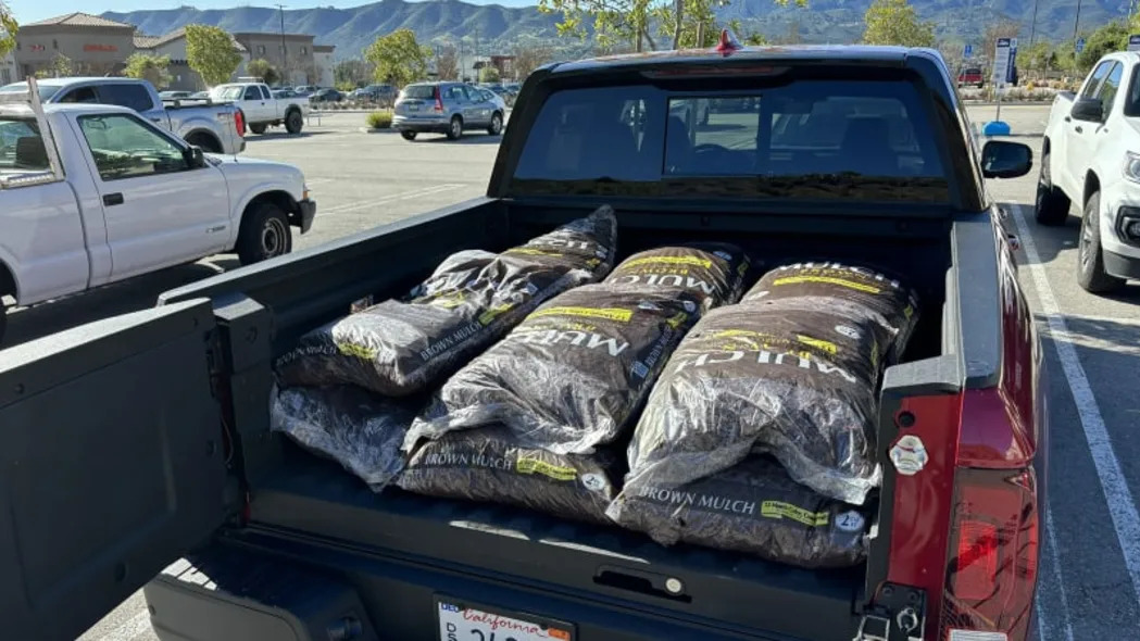2024 Honda Ridgeline TrailSport bed full of mulch