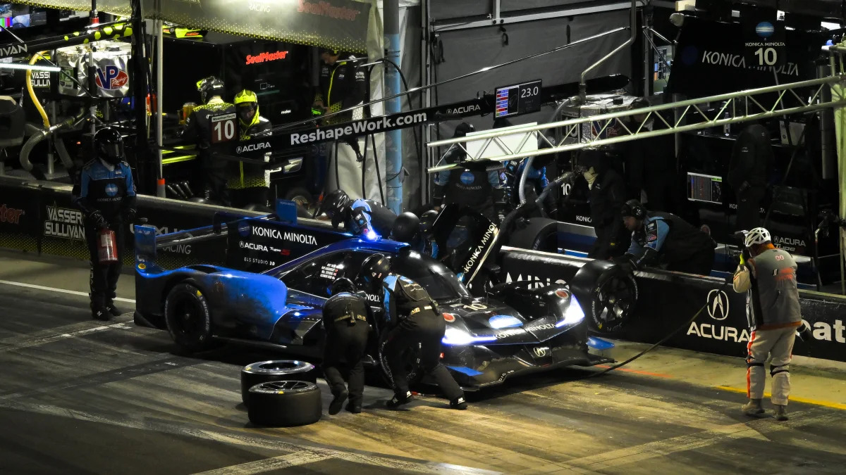 DAYTONA, FL - JANUARY 29: The #10 Konica Minolta Acura ARX-05 Cadillac DPi in the DPi class driven by Filipe Albuquerque, Alexander Rossi, Will Stevens and Ricky Taylor makes a pit stop during the IMSA Rolex 24 on January 29, 2022 at Daytona International Speedway Road Course in Daytona, FL. (Photo by Gavin Baker/Icon Sportswire via Getty Images)