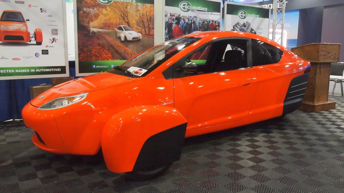 Elio Motors orange trike front three-quarter