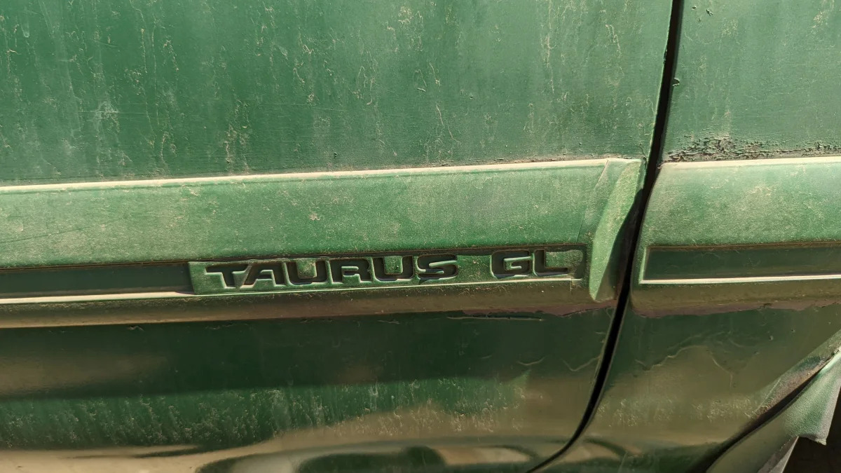 30 - 1986 Ford Taurus in Colorado junkyard - Photo by Murilee Martin