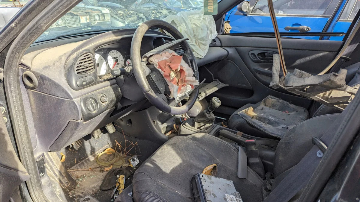 13 - 1998 Ford Contour SVT in Colorado junkyard - photo by Murilee Martin