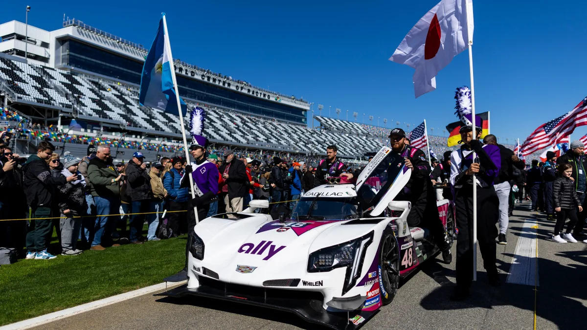 DAYTONA BEACH, FLORIDA - JANUARY 29: The #48 Ally Cadillac Racing Cadillac DPi of Jimmie Johnson, Kamui Kobayashi, Jose Maria Lopez, and Mike Rockenfeller is pushed during prerace before the start of the Rolex 24 at Daytona International Speedway on January 29, 2022 in Daytona Beach, Florida.   James Gilbert/Getty Images/AFP / AFP / GETTY IMAGES NORTH AMERICA / James Gilbert