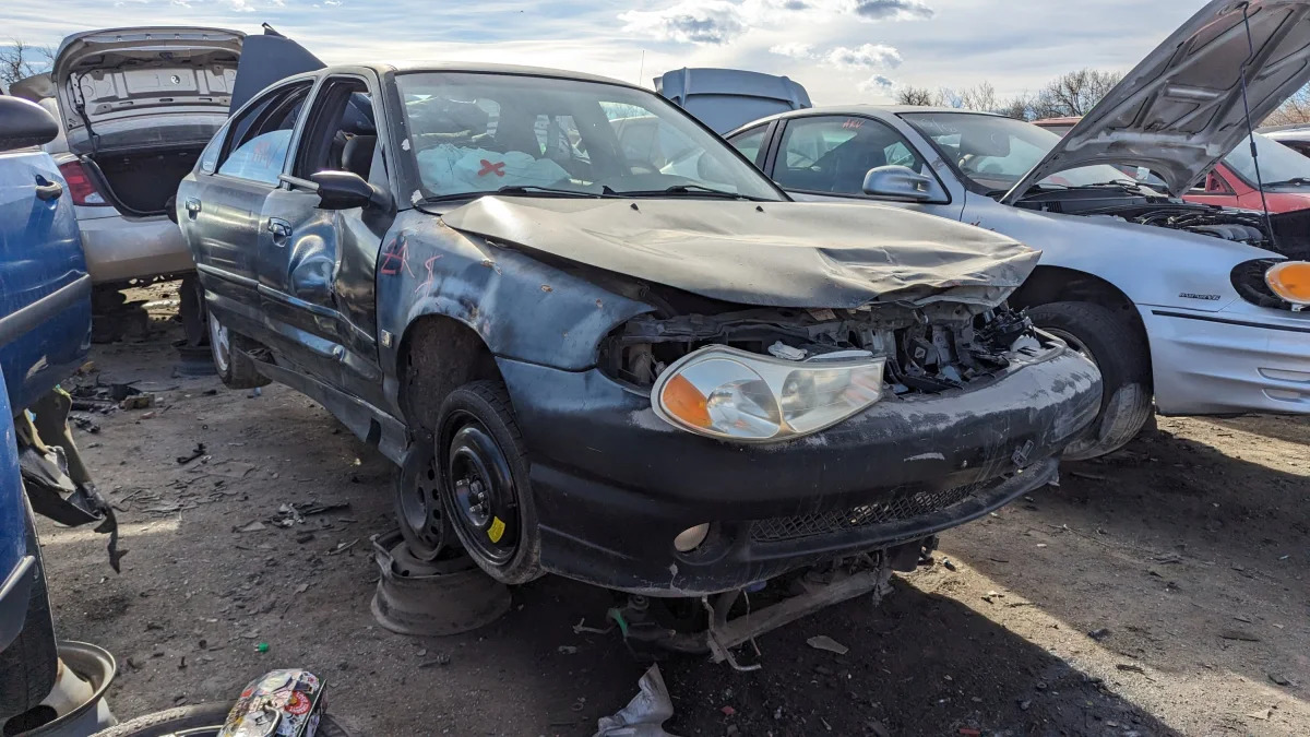 53 - 1998 Ford Contour SVT in Colorado junkyard - photo by Murilee Martin
