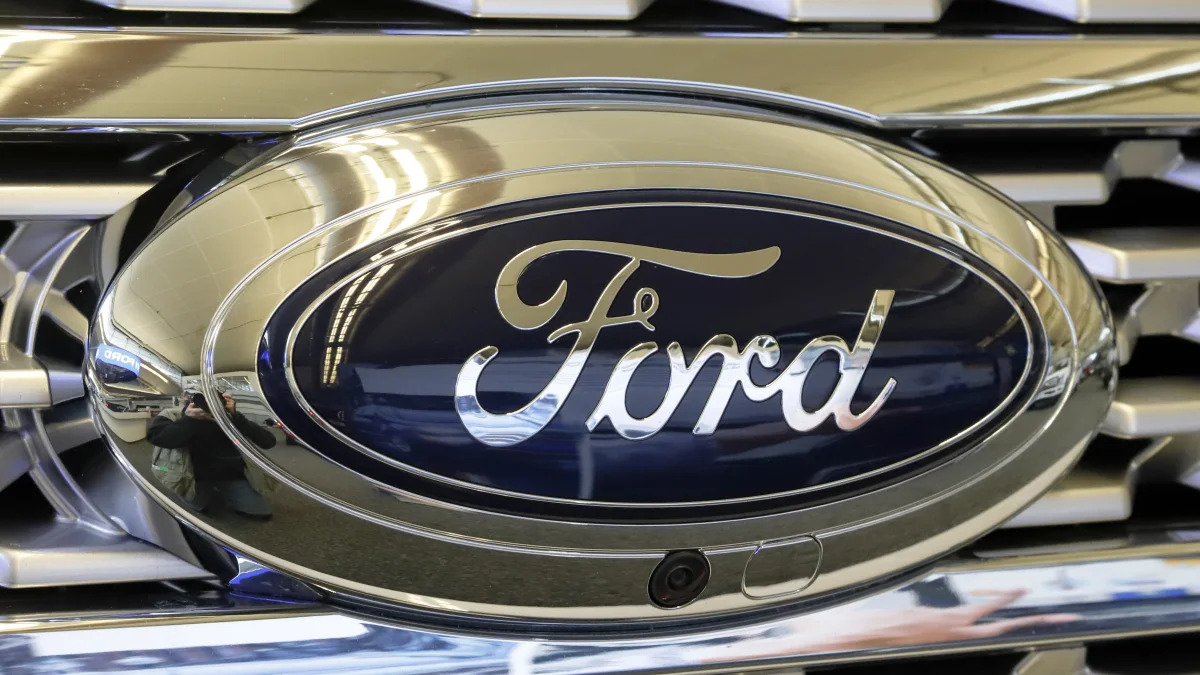 This is the Ford logo on the grill of a 2019 Ford Expedition 4x4 at the 2019 Pittsburgh International Auto Show in Pittsburgh Thursday, Feb. 14, 2019. (AP Photo/Gene J. Puskar)