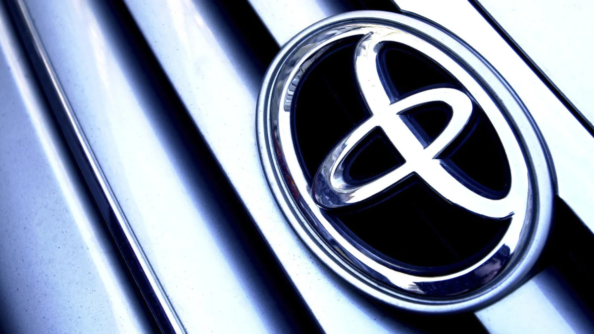 Picture shows a Toyota car emblem on a vehicle in Central London.