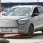 camouflaged silver ford escape spy shots front
