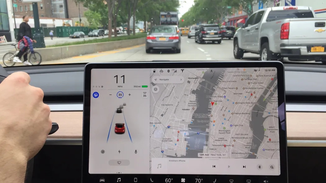 Tesla Autopilot closeup while driving in city