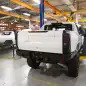 Two GMC HUMMER EVs completing their builds prior to shipping for