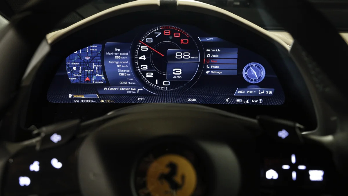 The dashboard of the Ferrari Roma car, unveiled in Rome, Thursday, Nov. 14, 2019. Ferrari unveils a new sports coupe aimed at enticing entry-level buyers and competing with the Porsche 911, part of a complete refresh of its model lineup by 2022. (AP Photo/Gregorio Borgia)