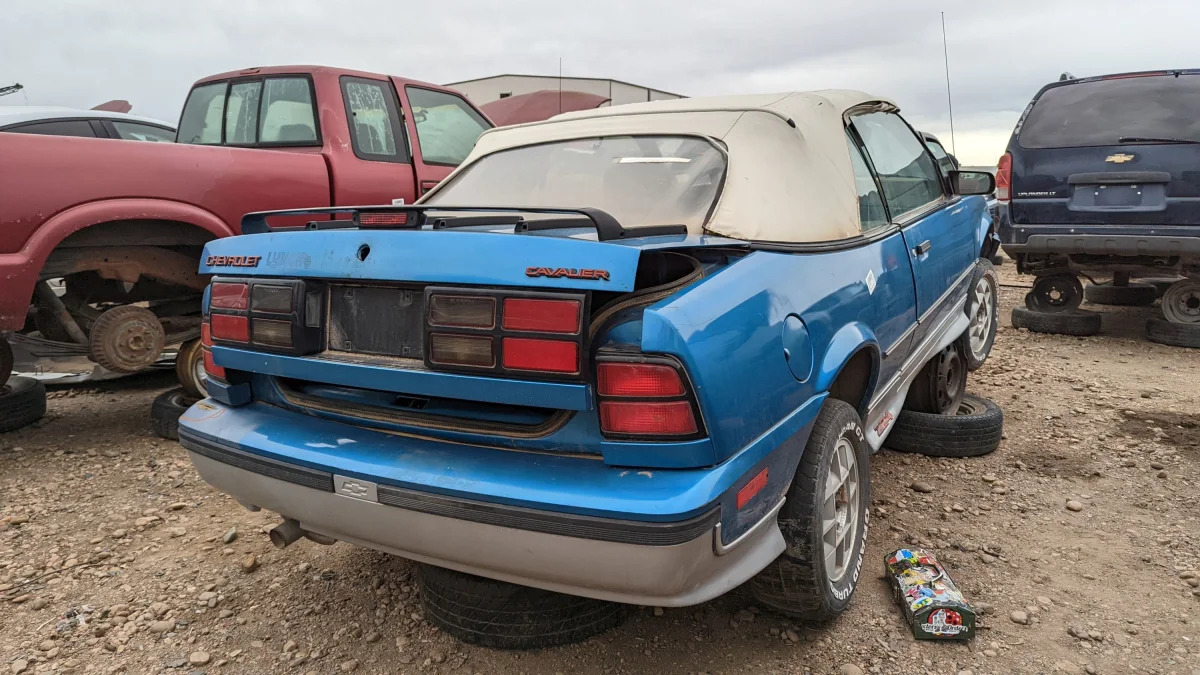 65 - 1989 Chevrolet Cavalier Z24 convertible in Colorado junkyard - Photo by Murilee Martin