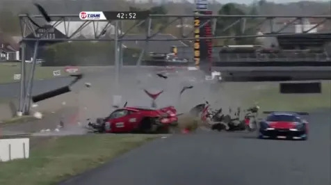 <h6><u>Driver limps away from massive Ferrari crash</u></h6>