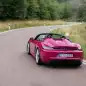 2024 Porsche 718 Spyder RS in Ruby Star Neo action rear high