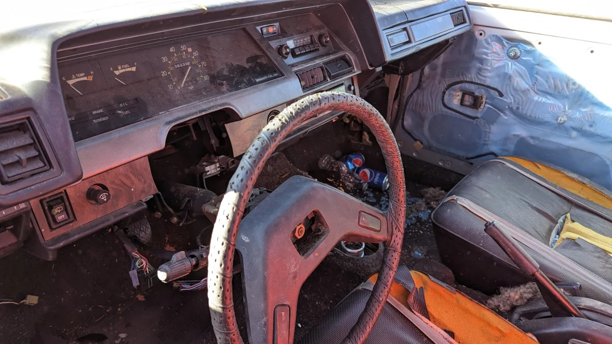 16 - 1980 Toyota Corolla station wagon in Colorado wrecking yard - photo by Murilee Martin