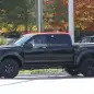 black 2017 ford f-150 raptor supercrew spy shot wheels and fenders