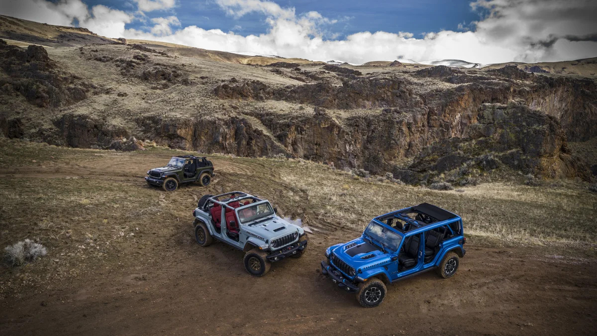 (Left to right) New 2024 Jeep® Wrangler Willys, Wrangler Rubico