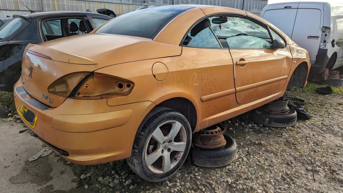 34 - 2006 Peugeot 307CC in British wrecking yard - photo by Murilee Martin