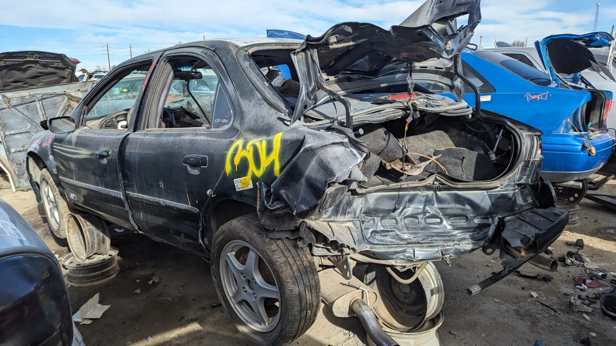 45 - 1998 Ford Contour SVT in Colorado junkyard - photo by Murilee Martin