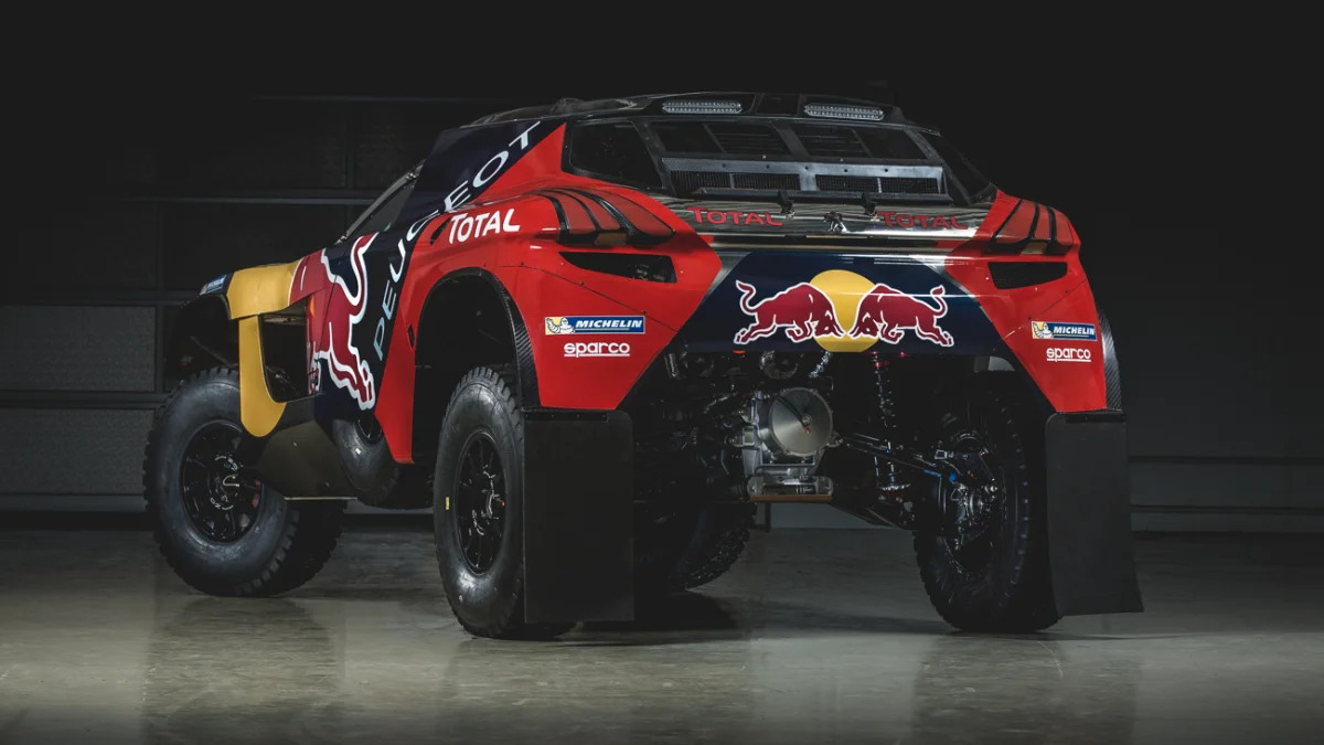 The Peugeot 2008 DKR for the 2016 Dakar Rally, rear three-quarter view.
