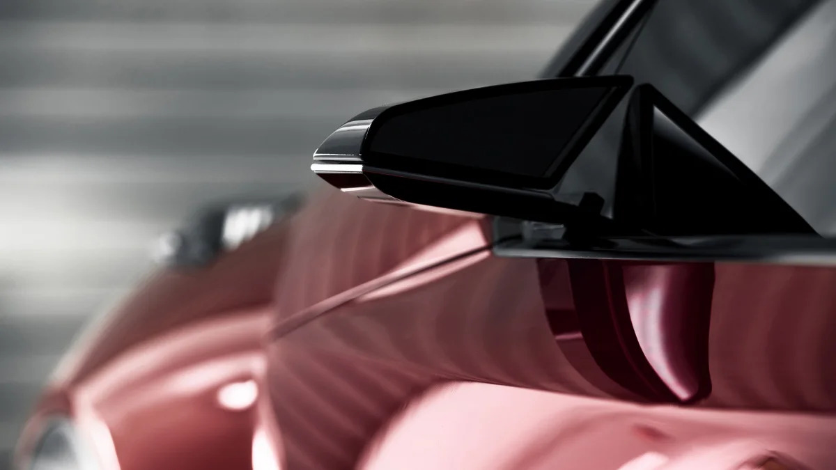 The Scion C-HR concept shown off in red for the LA Auto Show, mirror.