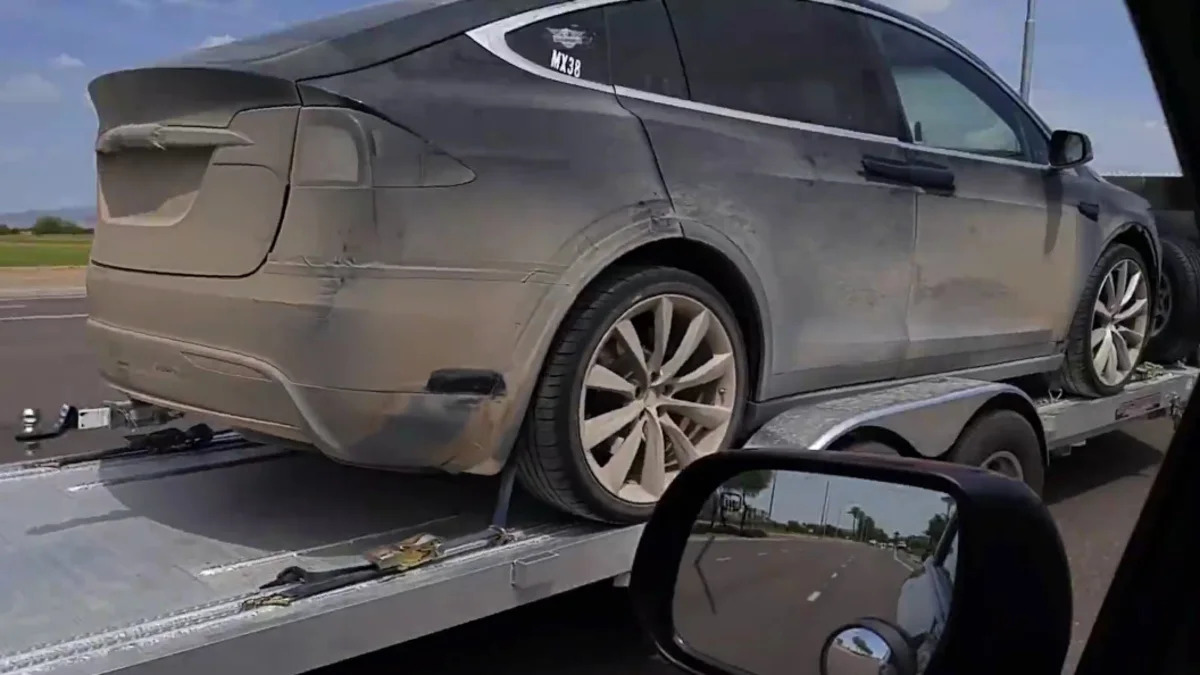 A Tesla Model X on a trailer in Arizona after some offroad testing.