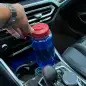 2023 BMW M2 - front cupholders with bottle