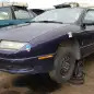 00 - 1996 Saturn SC in Colorado wrecking yard - photo by Murilee Martin