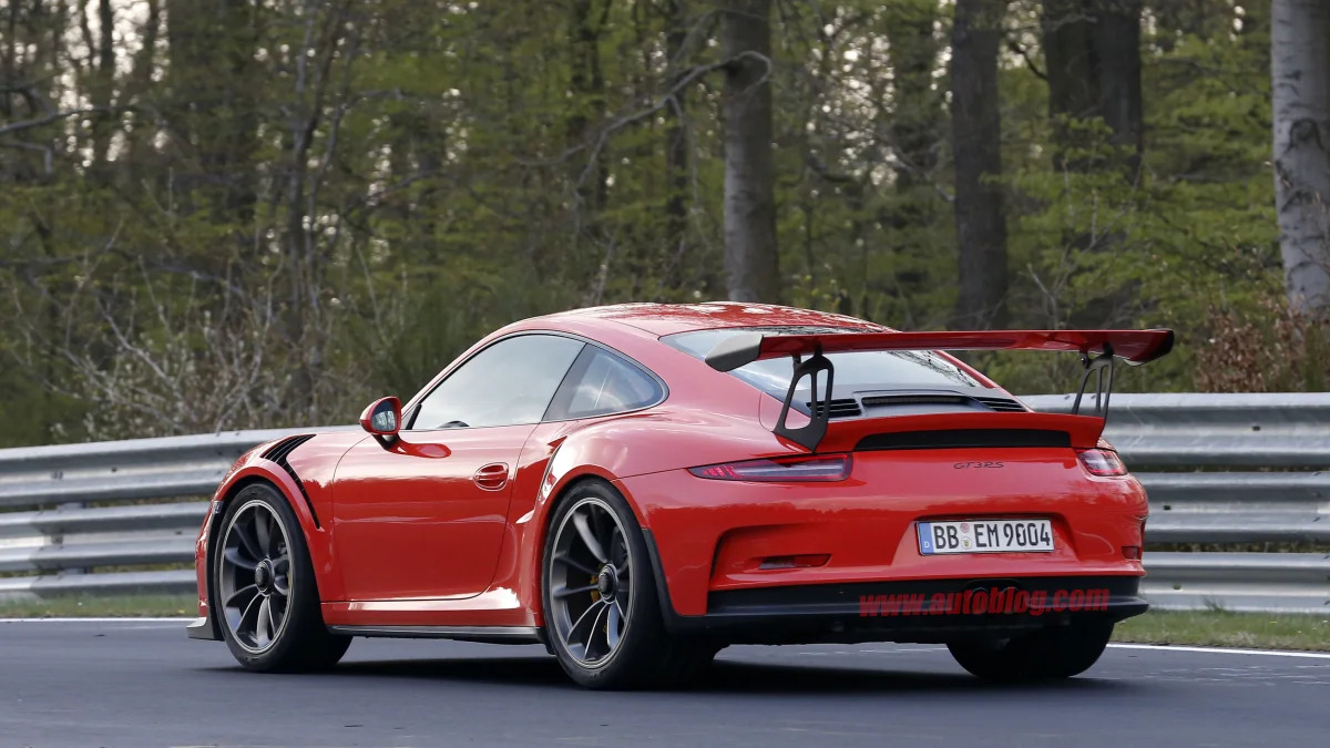 Mark Webber does promotional work in the new Porsche 911 GT3 RS at the Nuerburgring, rear view.