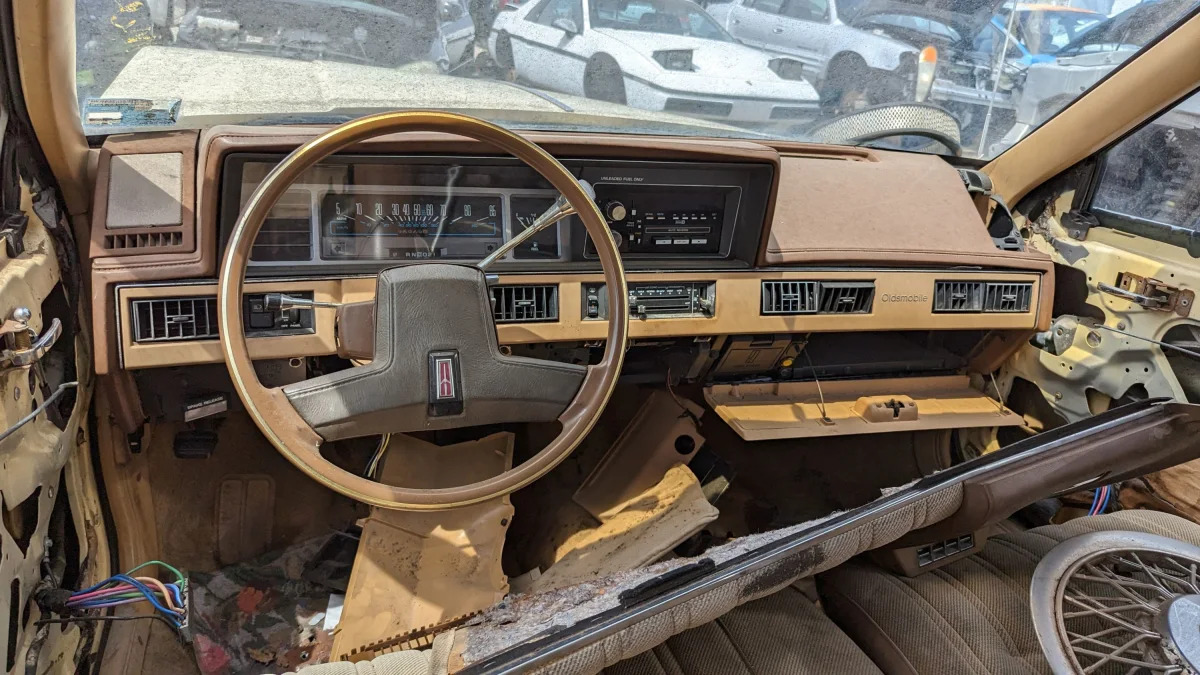 18 - 1986 Oldsmobile Cutlass Cruiser in Oklahoma junkyard - photo by Murilee Martin