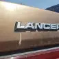 06 - 1986 Dodge Lancer in Colorado wrecking yard - photo by Murilee Martin