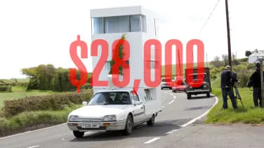 Here's $28,000. Buy something to BE a camper