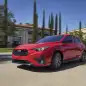 2024 Subaru Impreza RS action front three quarter town