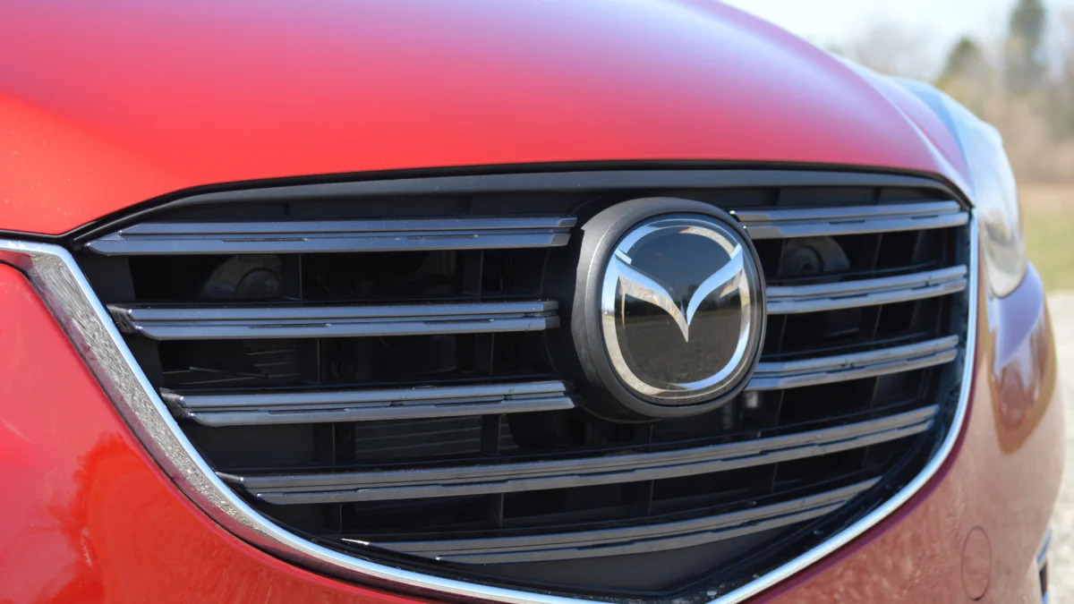 2016 Mazda CX-5 soul red grille detail badge