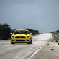 yellow hennessey performance hpe750 mustang on the road