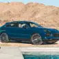 2024 Porsche Cayenne S Coupe front three quarter by a pool