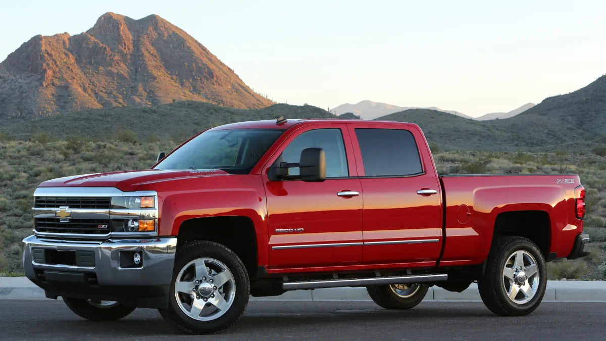 2015 Chevy Silverado in red with mountains