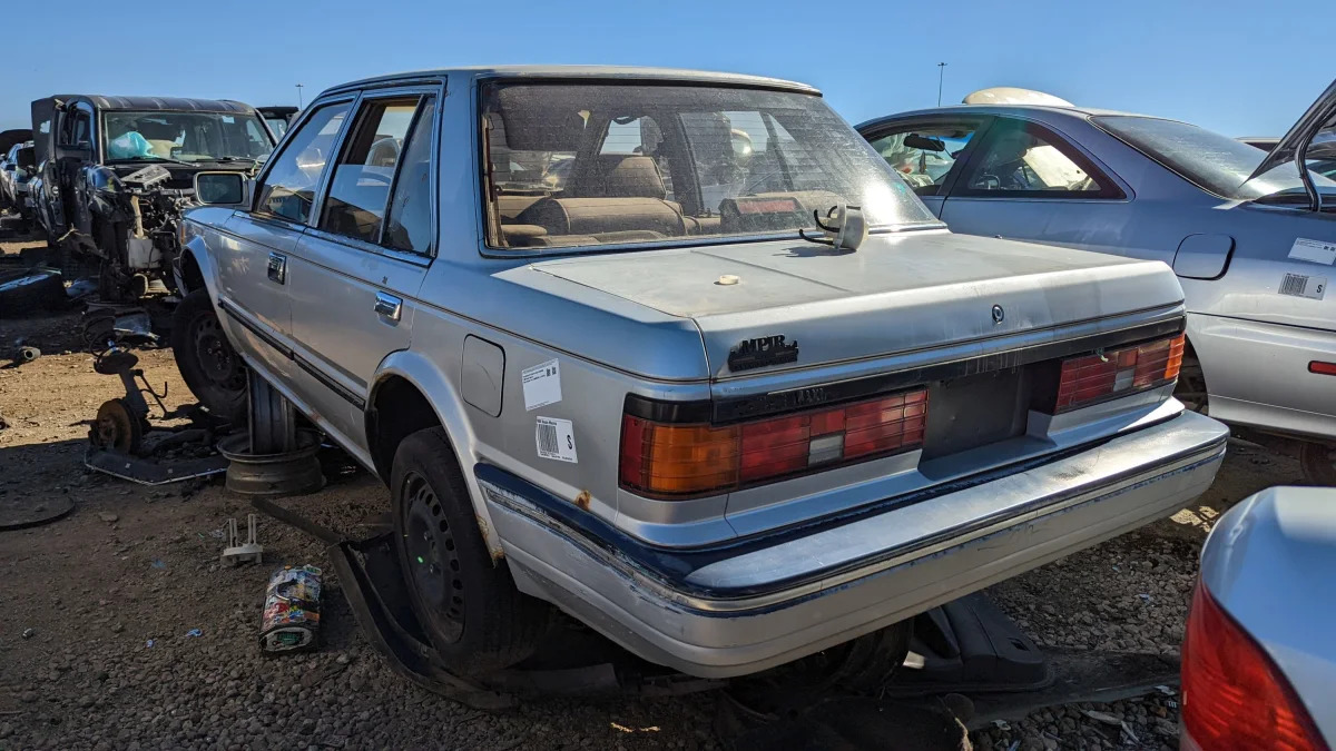 55 - 1988 Nissan Maxima in Colorado junkyard - photo by Murilee Martin