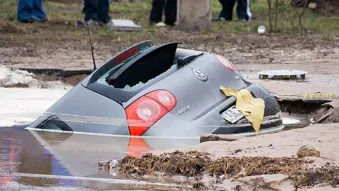 Ukrainian pothole swallows VW Golf
