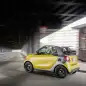 The 2016 Smart Fortwo Cabriolet, rear three-quarter dynamic.