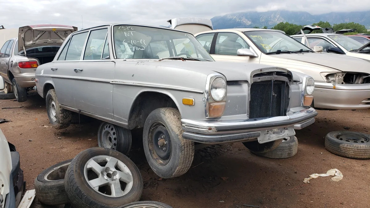 00 - 1971 Mercedes-Benz W115 in Colorado wrecking yard - photo by Murilee Martin